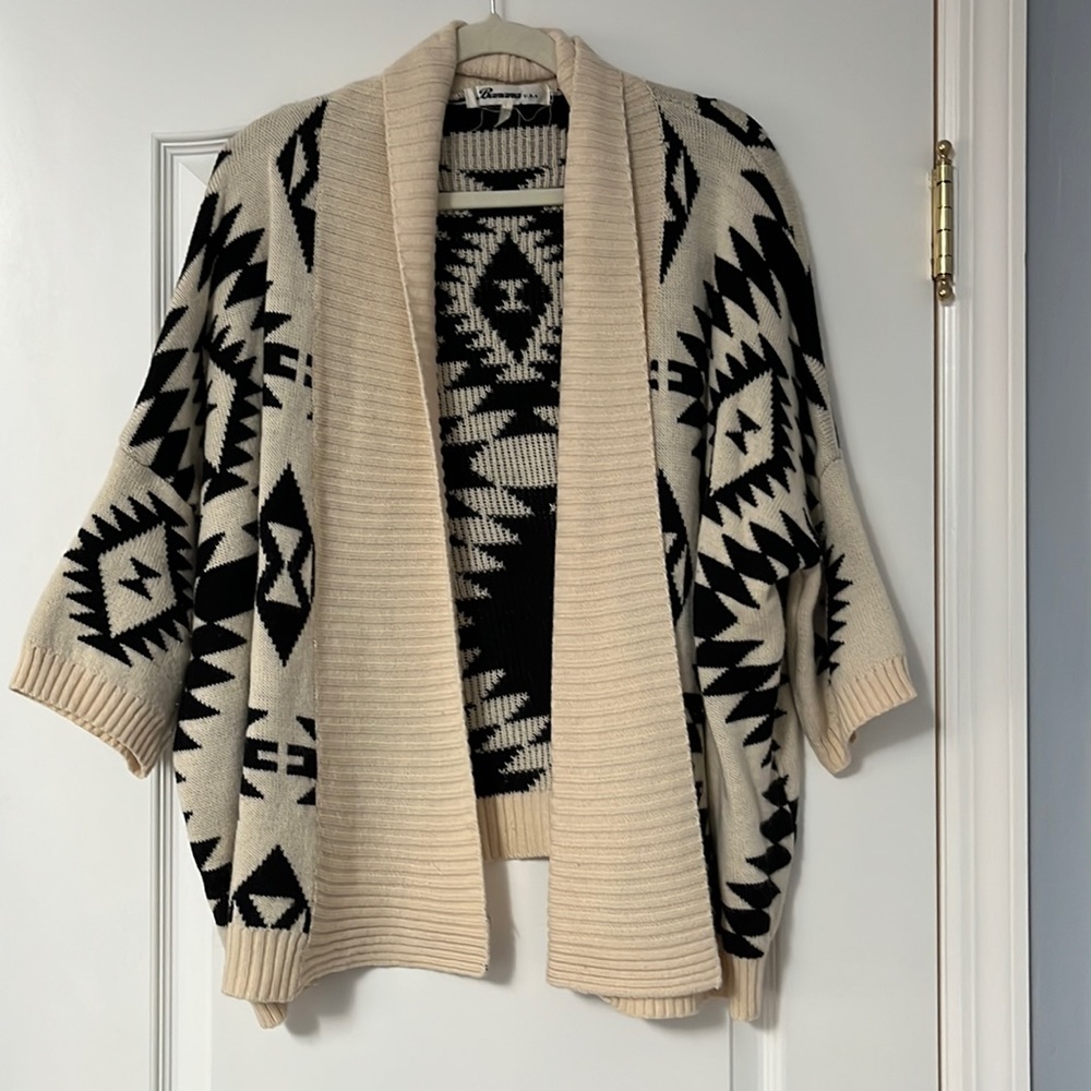 Black and cream sweater